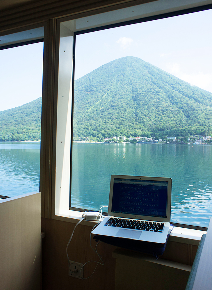 A laptop powered from a passenger outlet aboard Nantai